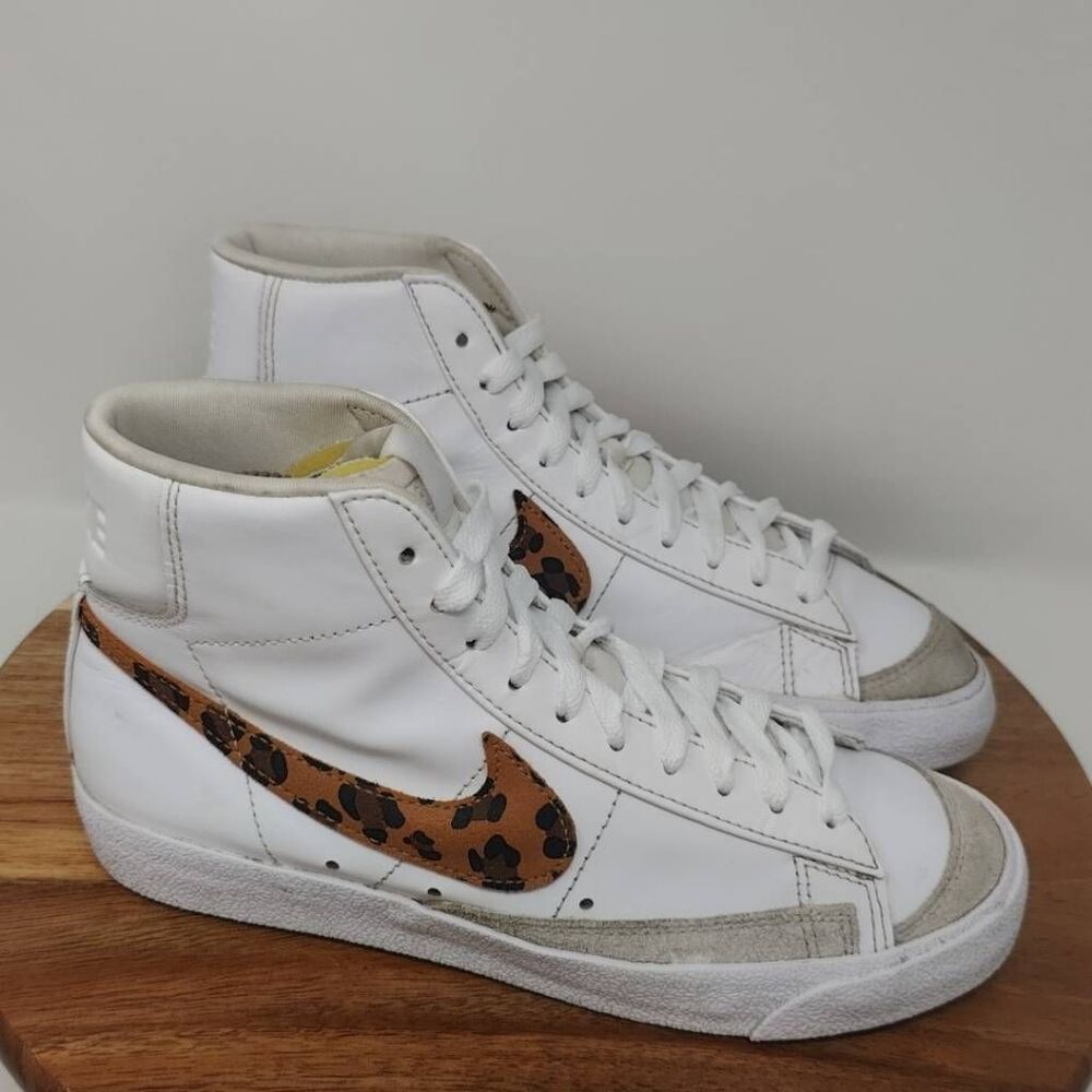 Nike White High-Top Sneakers with Leopard Print Swoosh
